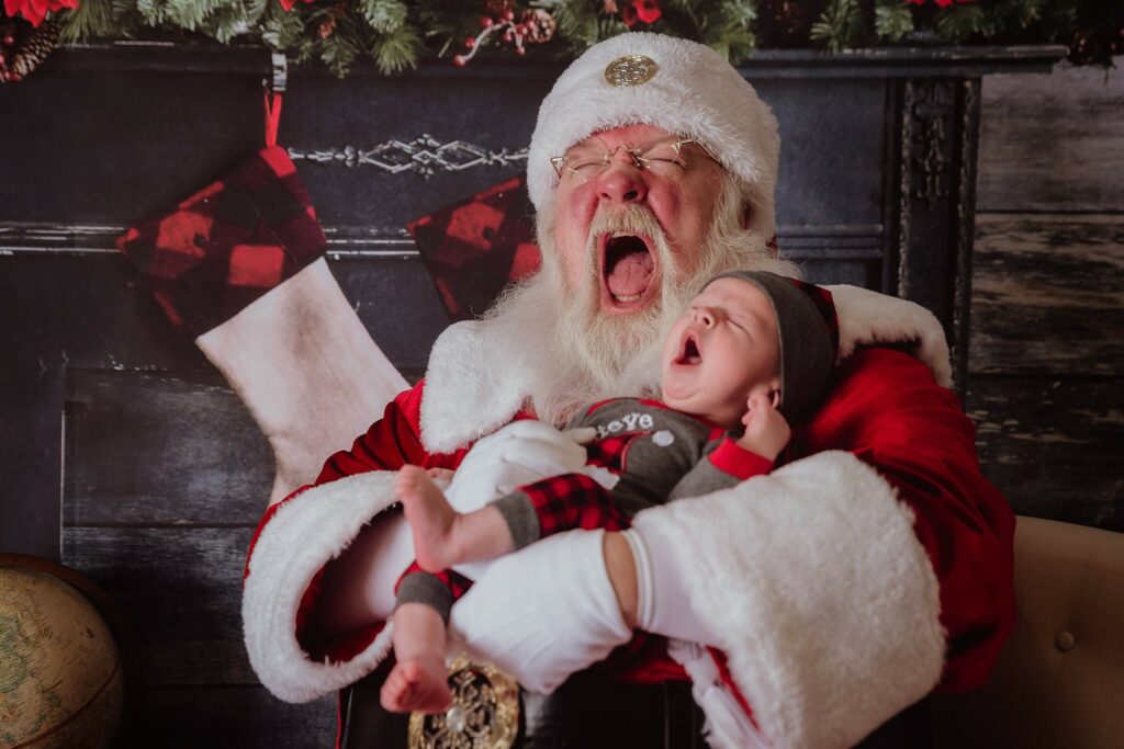 Santa Claus yawning during photo shoot